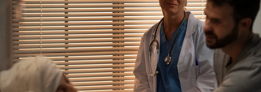 Clinicians attending to an urgent care patient