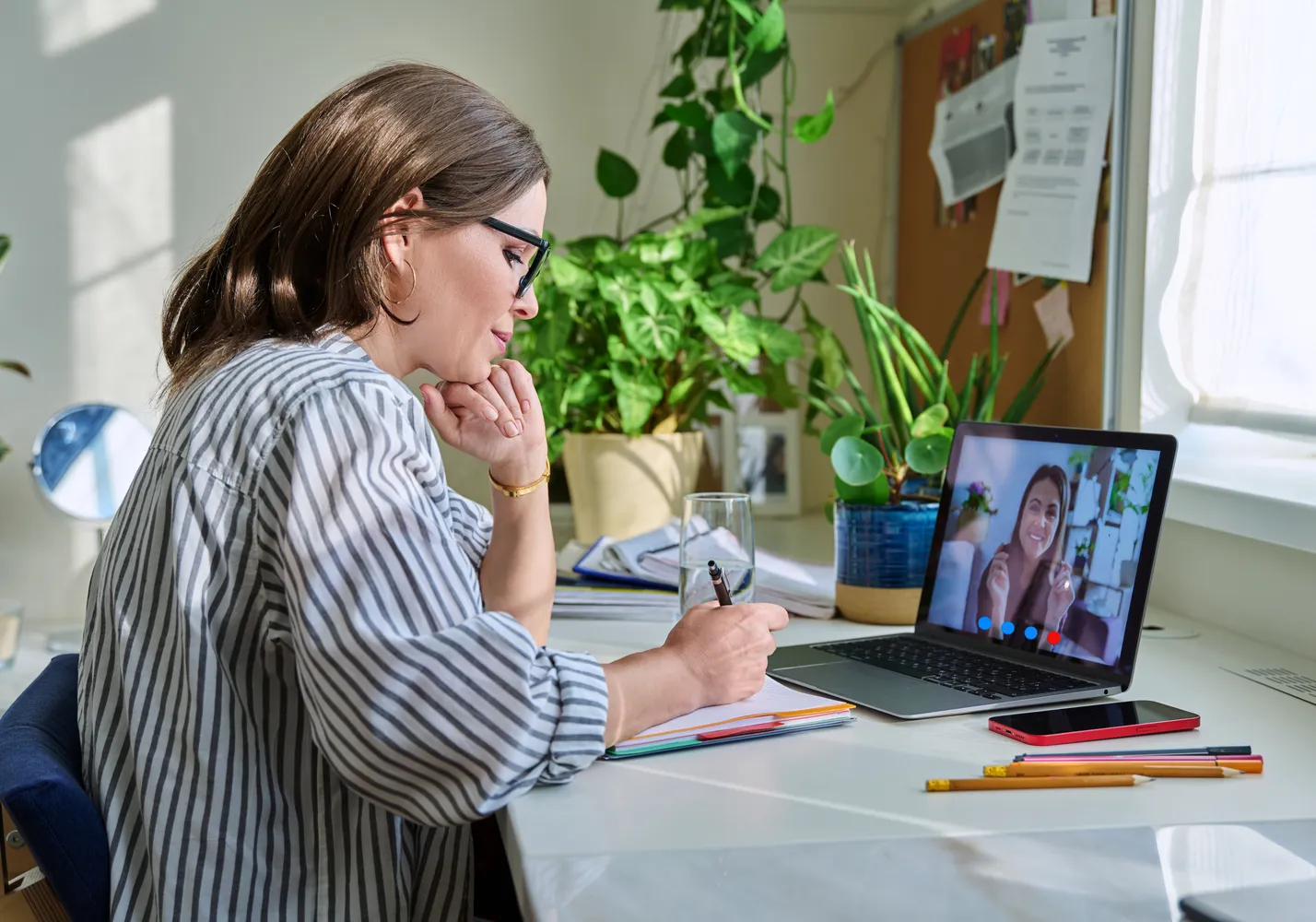 Telehealth mental health session on a laptop